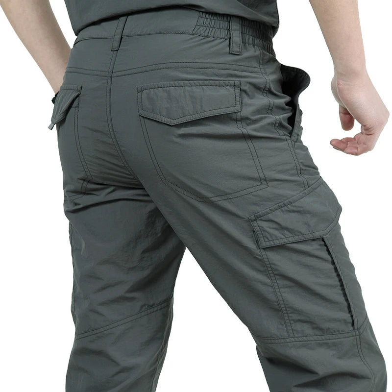 Pantalones de carga tácticos impermeables para exteriores 2023, pantalones largos militares informales transpirables de verano para hombre, pantalones de carga de secado rápido para hombre